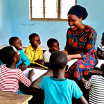 Psychological Support for Children**

A group of children, fully clothed in modest clothing, are drawing with crayons under the supervision of a friendly teacher in a bright and cheerful community center in Cameroon. The room is decorated with colorful artwork.  Emphasis on the children's expressions of hope and resilience.  Safe for work, appropriate content, family-friendly, perfect anatomy, natural proportions, professional illustration, high quality.

**